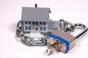 Miniature House With Lock and Chain